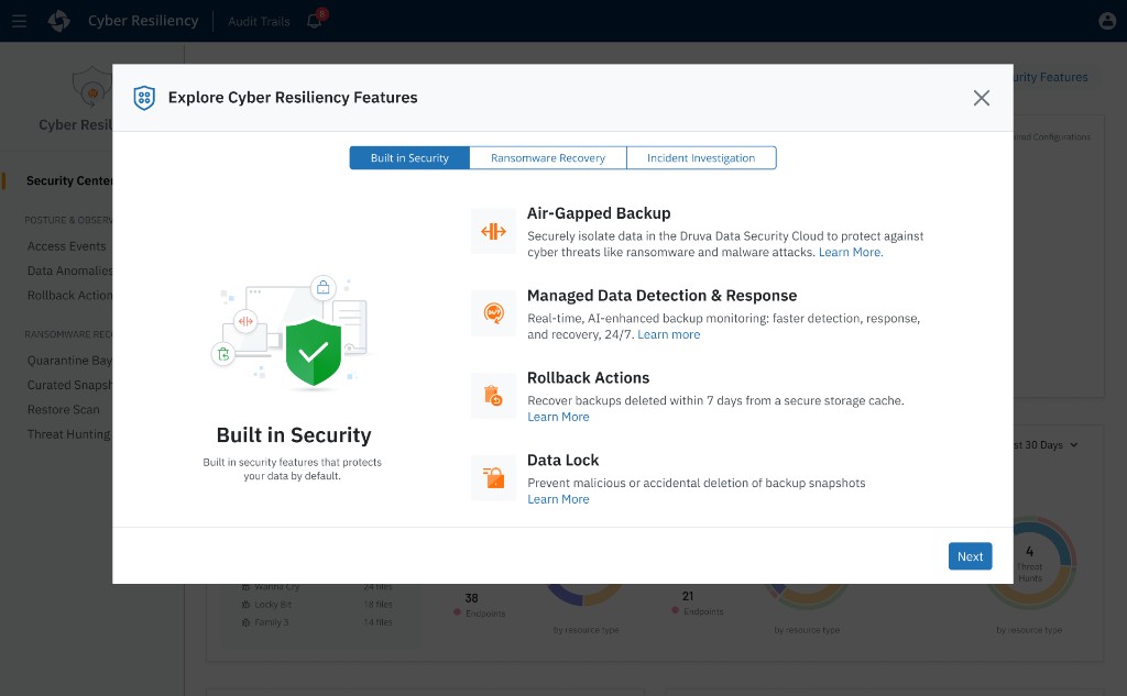 Explore Cyber Resiliency Features modal on Built in Security tab showing Air-Gapped Backup, Managed Data Detection and Response, Rollback Actions, and Data Lock